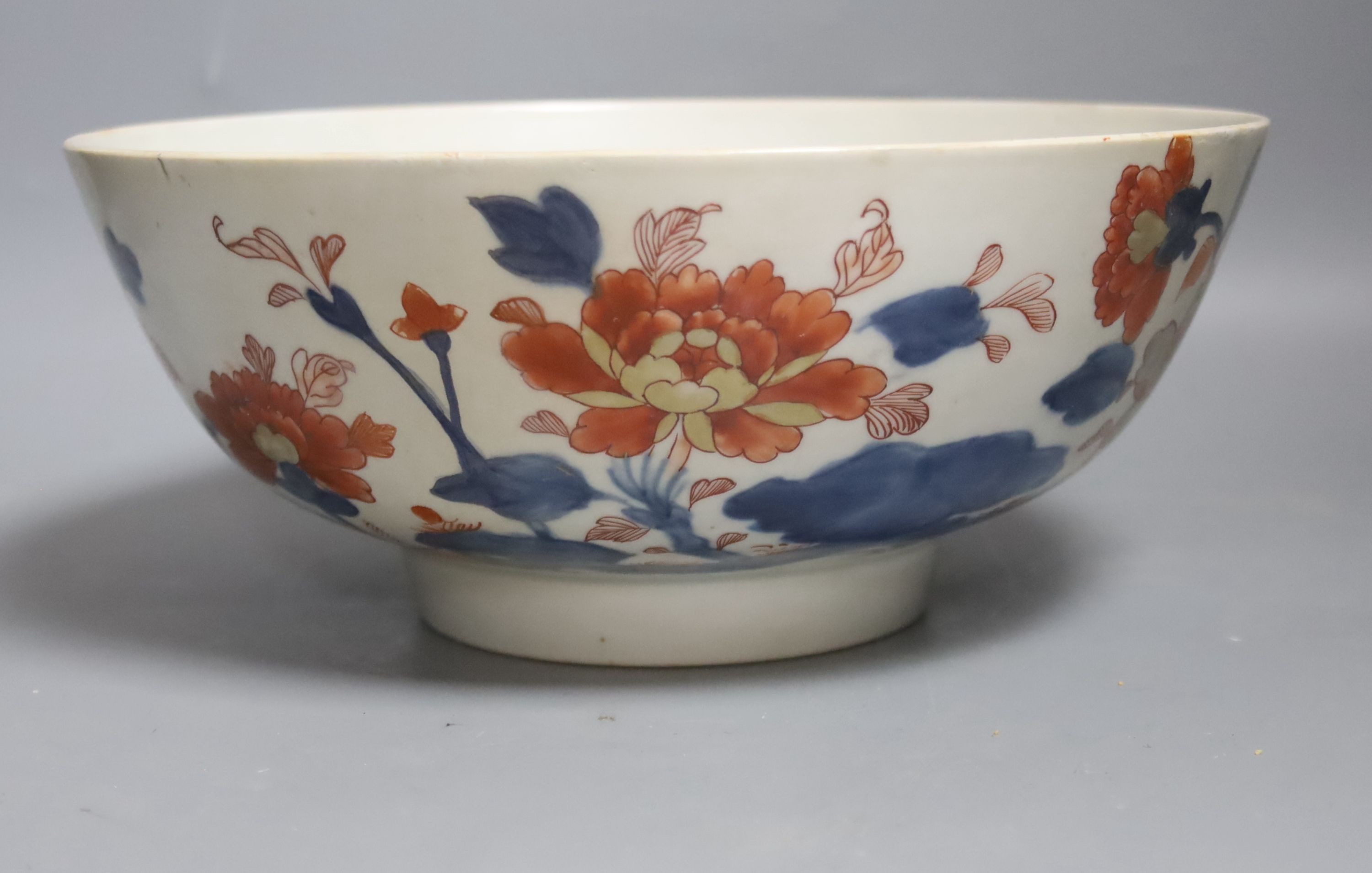 Three 18th century Chinese export porcelain bowls, largest 28 cm and two plates